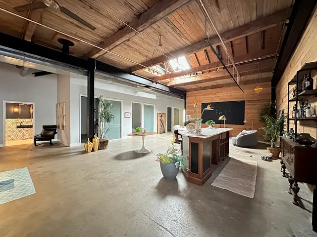 a view of a chairs and table in the room