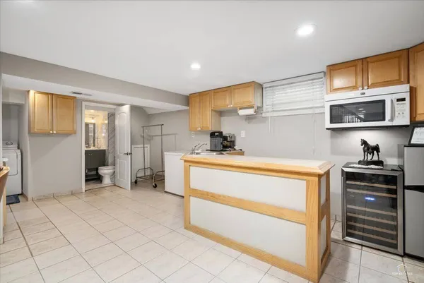 a kitchen with stainless steel appliances granite countertop a stove and a sink