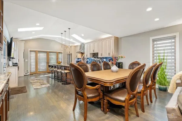 a view of a dining room with furniture