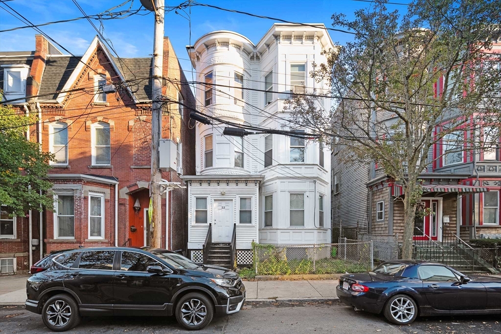 53 Copeland Street, Unit 2 Boston, MA 02119 - Photo 15 of 15 a car parked in front of a house