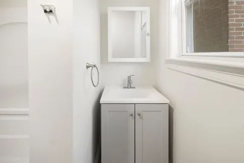 a bathroom with a sink and a vanity