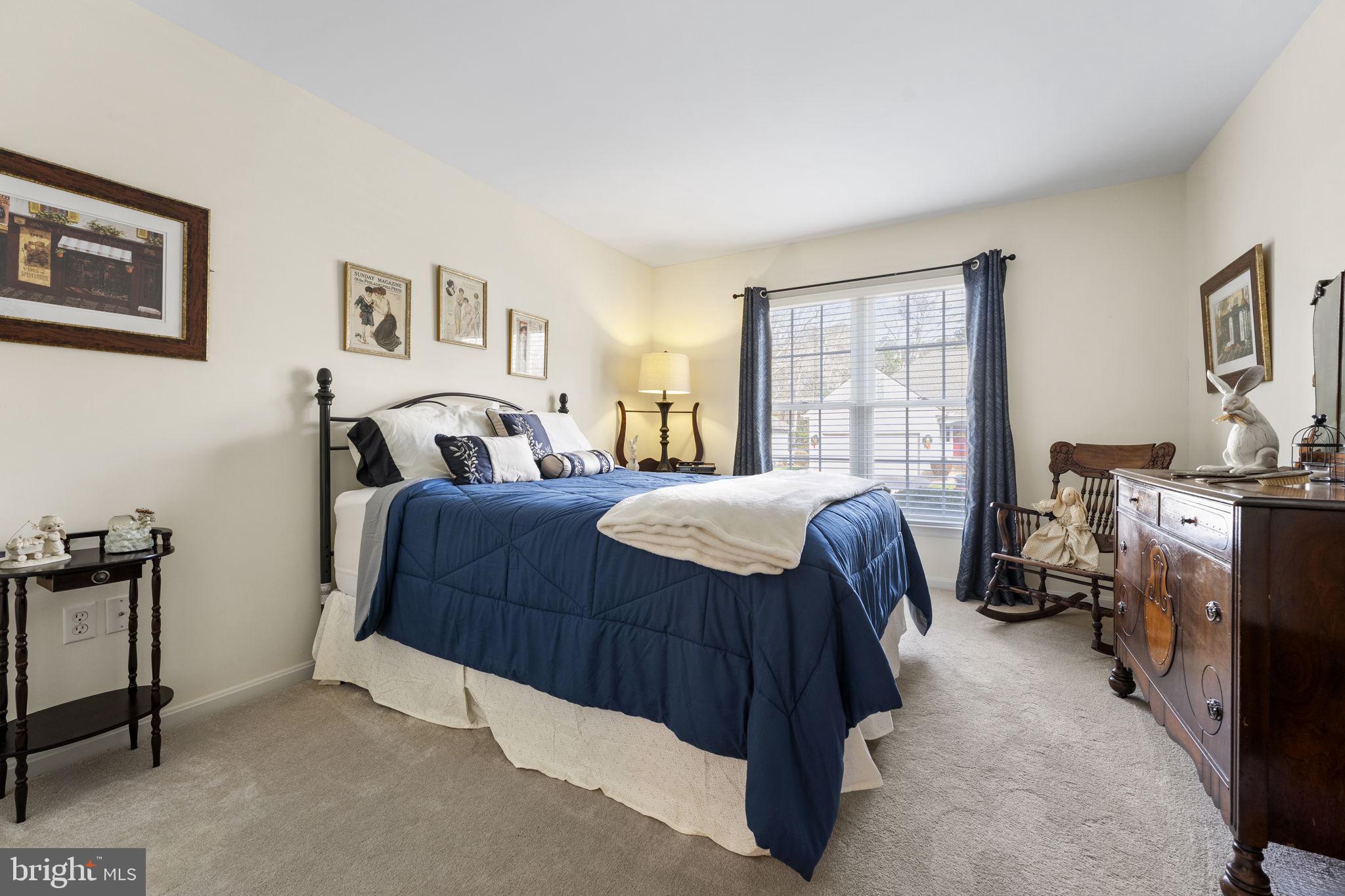 212 Spring Crest Drive Salisbury, MD 21804 - Photo 32 of 42 a bedroom with a bed and a window