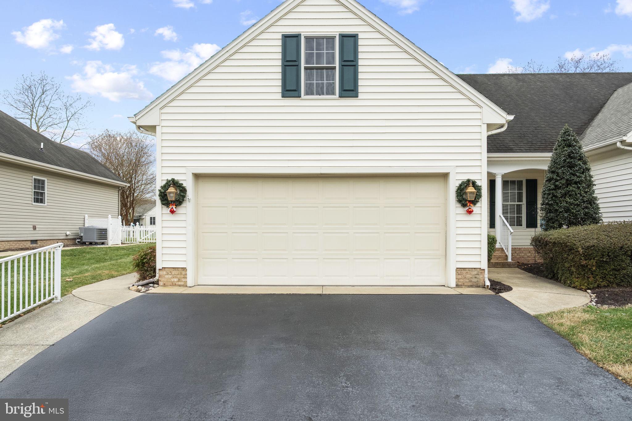 212 Spring Crest Drive Salisbury, MD 21804 - Photo 40 of 42 a view of a house with a garage