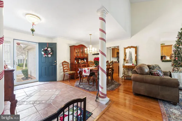 a livingroom with furniture and a wooden floor