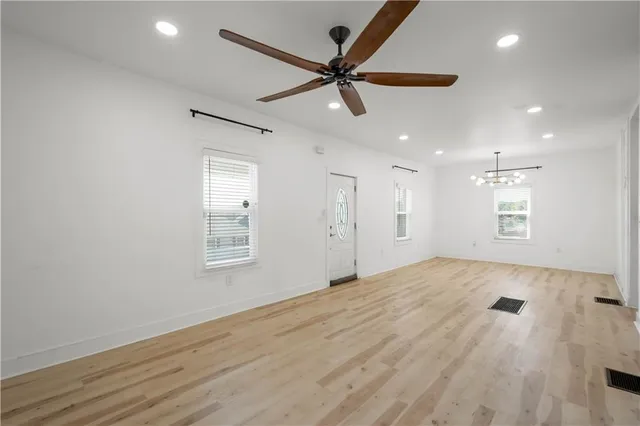 a view of an empty room with a window