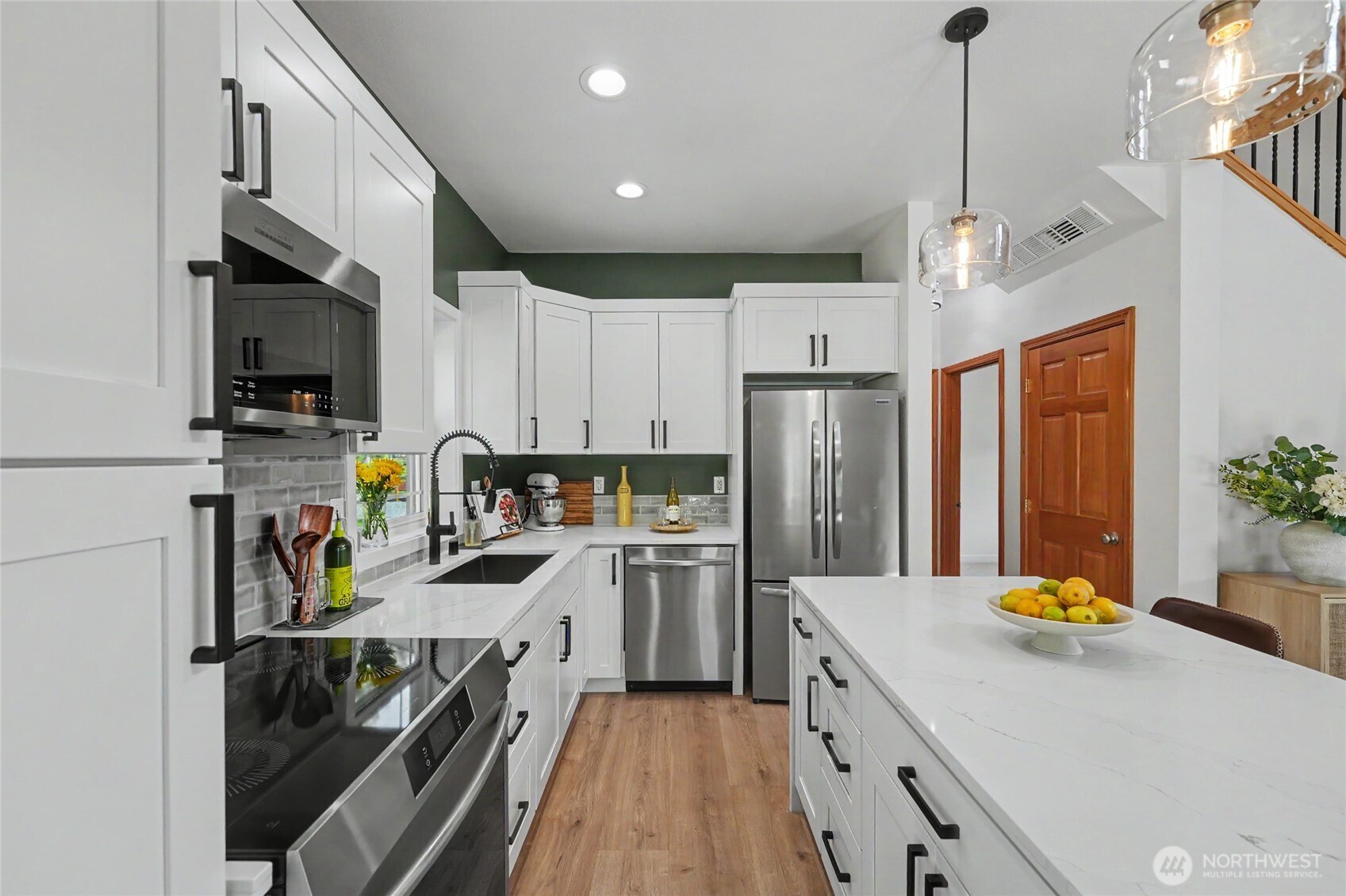 93 Golf Course Drive Pateros, WA 98846 - Photo 6 of 34 a kitchen with refrigerator a stove and a sink