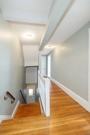a view of a livingroom with wooden floor