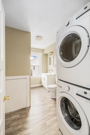 a utility room with dryer and washer
