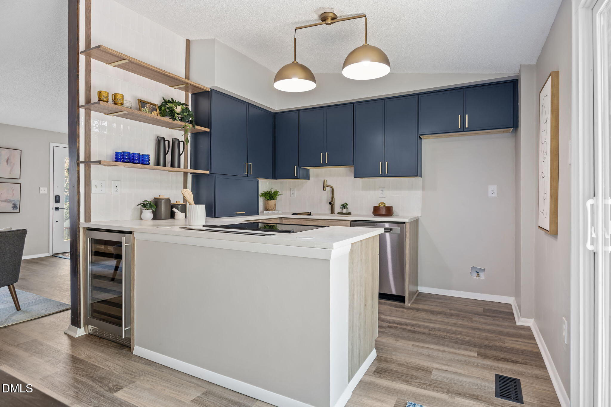 7809 Kitty Lane Raleigh, NC 27615 - Photo 6 of 29 Kitchen w/wine fridge, downdraft vent retracted