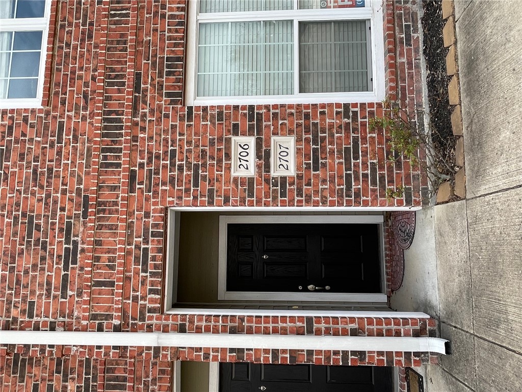 1198 Jones-Butler Road, Unit 2706 College Station, TX 77840 - Photo 2 of 17 a front view of a building with a window