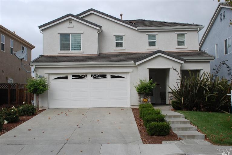 a view of house with garden