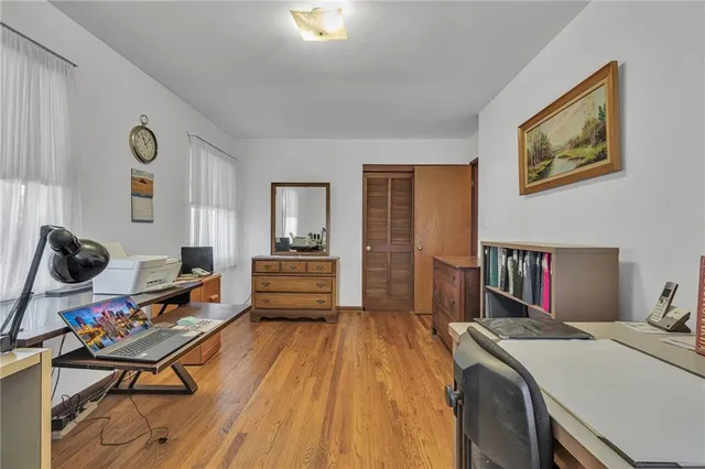 a bedroom with a bed and furniture