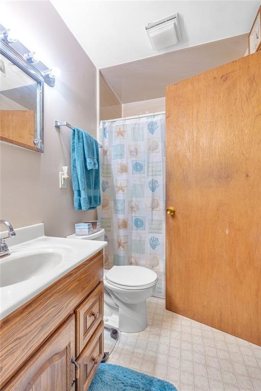111 Truman Street Monaca, PA 15061 - Photo 7 of 23 a bathroom with a sink a toilet and shower