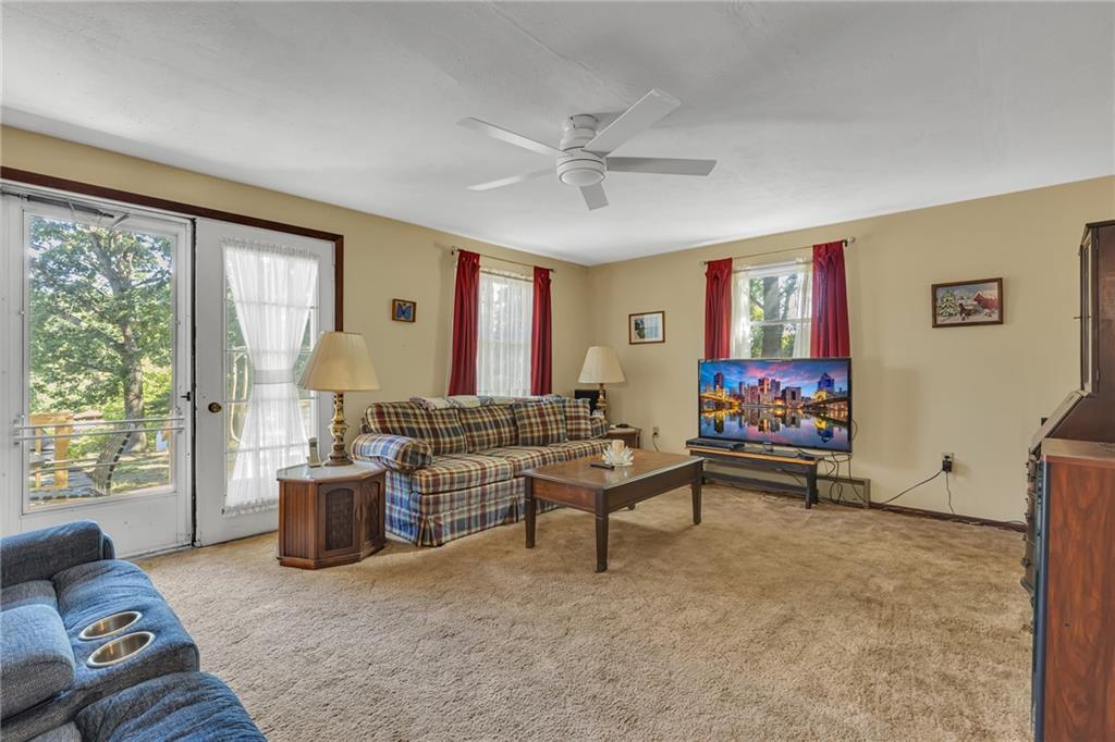 111 Truman Street Monaca, PA 15061 - Photo 8 of 23 a living room with furniture and a large window