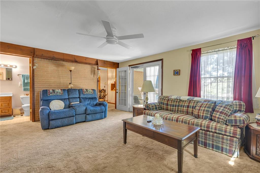 111 Truman Street Monaca, PA 15061 - Photo 9 of 23 a living room with furniture and a large window