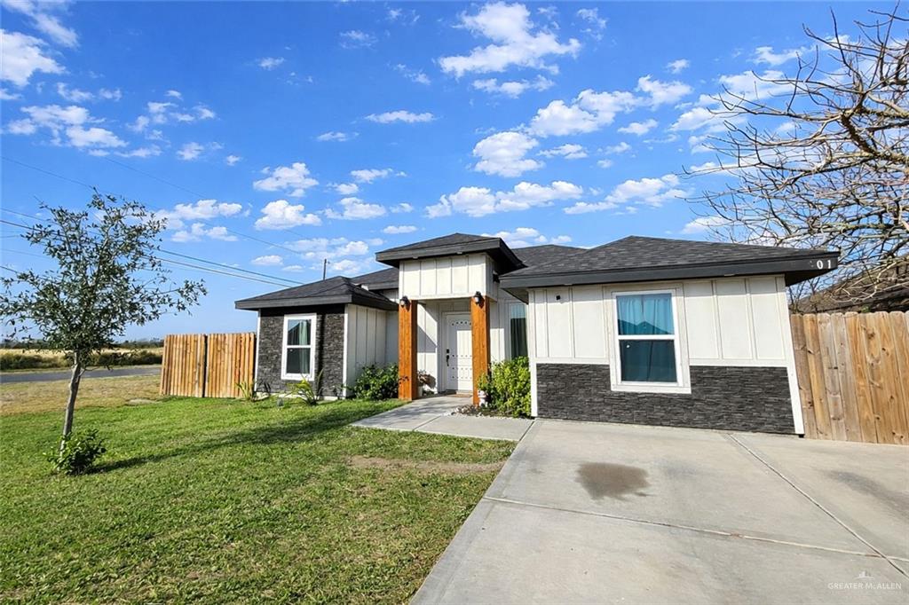 901 Noelia Street Edcouch, TX 78538 - Photo 1 of 1 a front view of a house with a yard