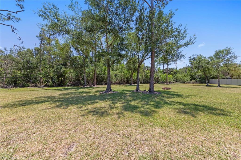 3795 Liberty Square Fort Myers, FL 33908 - Photo 39 of 43 a view of outdoor space with trees