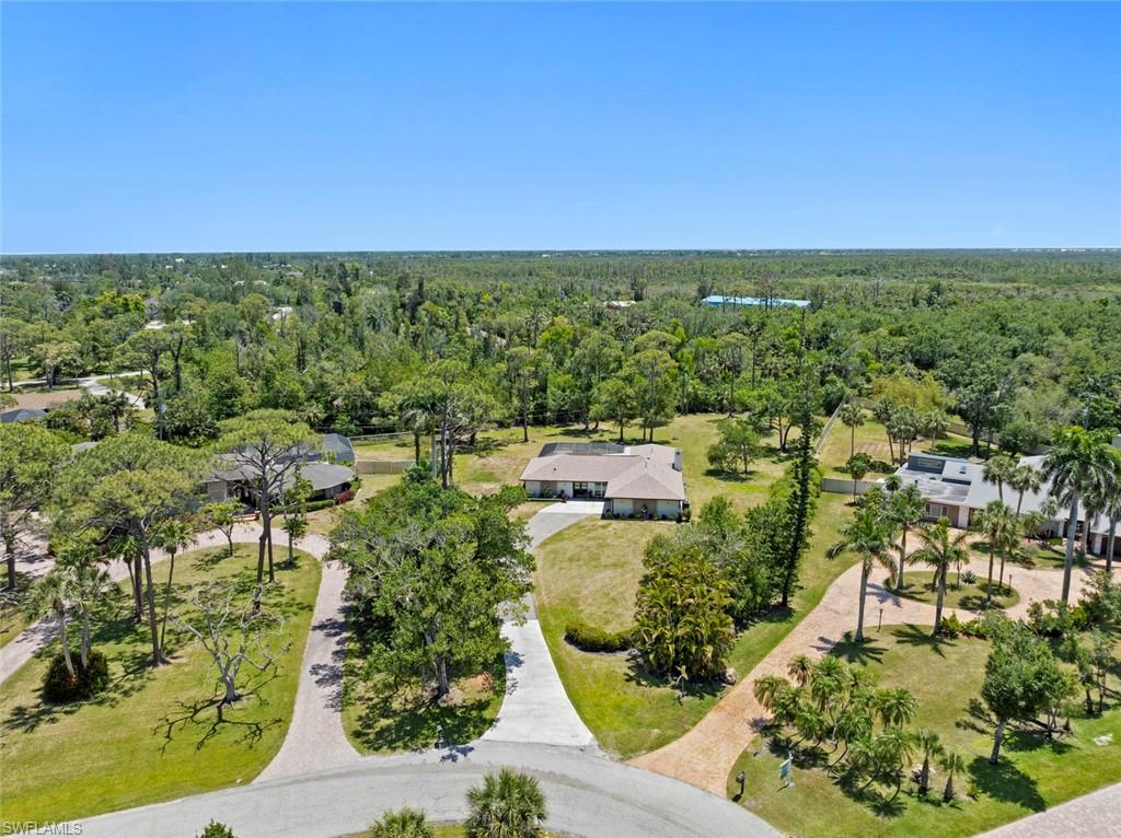 3795 Liberty Square Fort Myers, FL 33908 - Photo 5 of 43 an aerial view of residential houses with outdoor space and trees