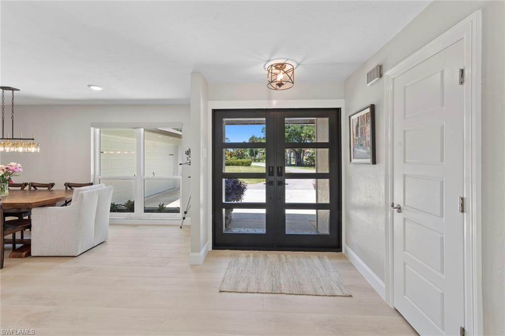 3795 Liberty Square Fort Myers, FL 33908 - Photo 7 of 43 a view of an entryway with a livingroom