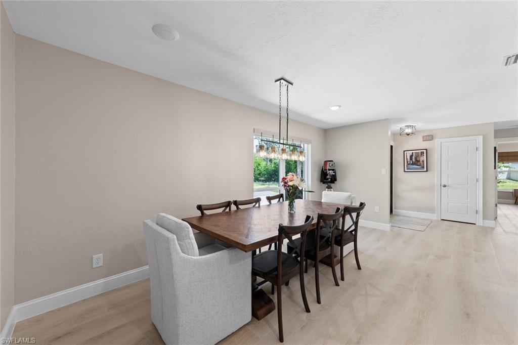 3795 Liberty Square Fort Myers, FL 33908 - Photo 9 of 43 a view of a dining room with furniture