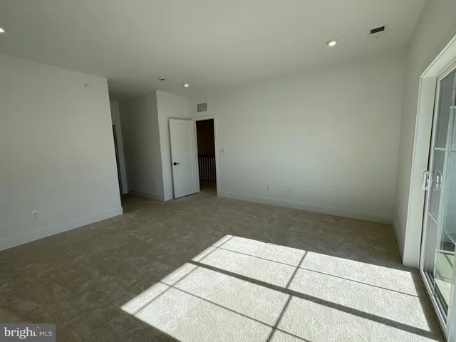 a bathroom with a sink vanity and a mirror