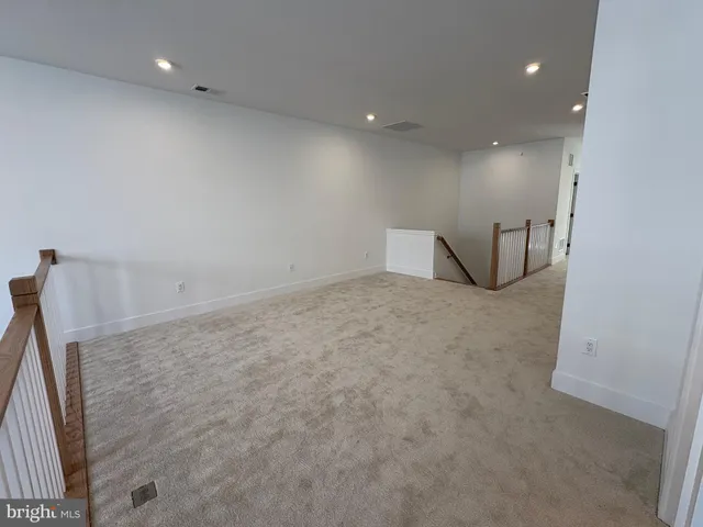 a view of hallway with sink