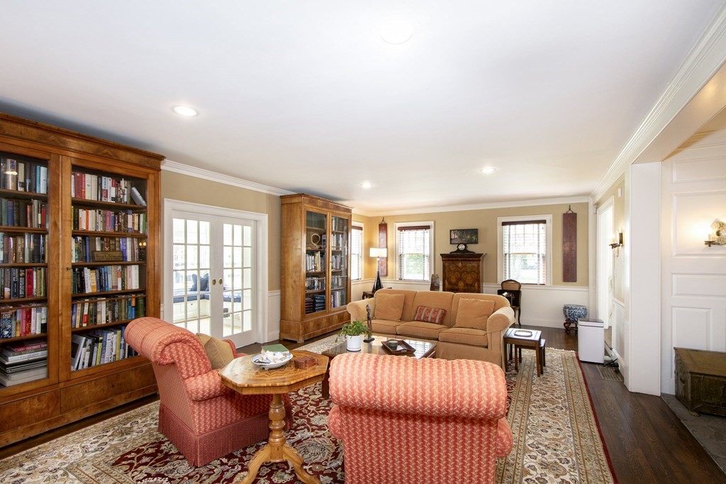 10 River Road Cohasset, MA 02025 - Photo 14 of 42 a living room with furniture and a flat screen tv