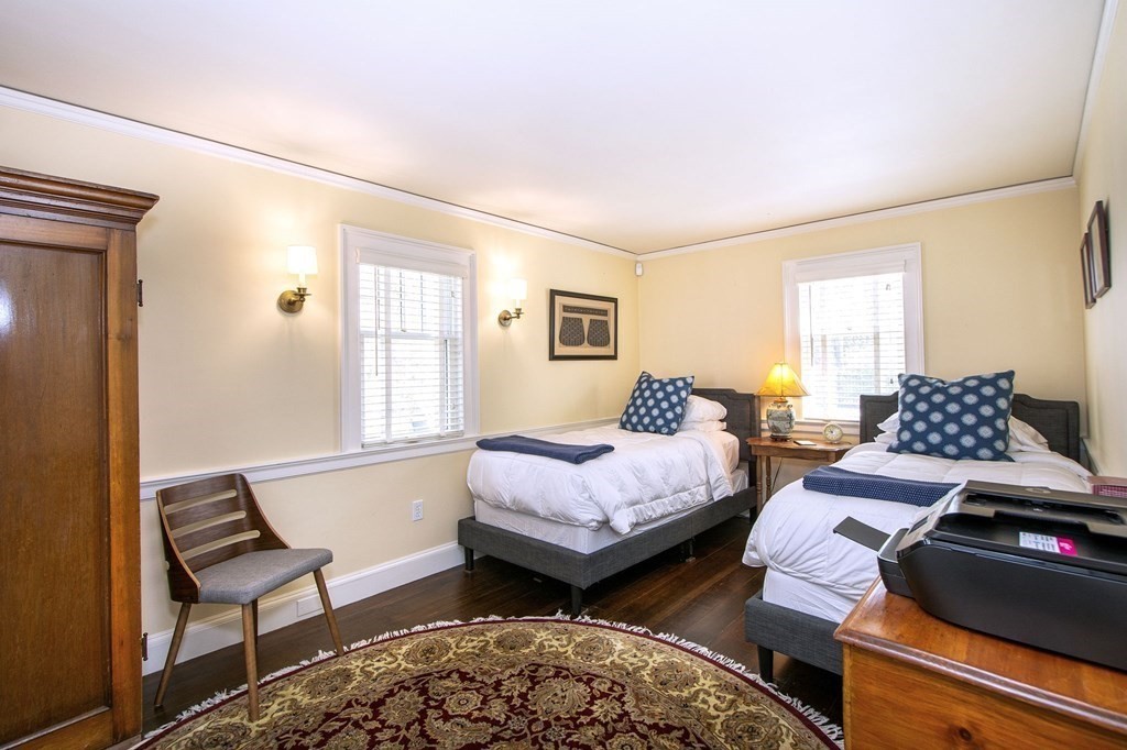 10 River Road Cohasset, MA 02025 - Photo 20 of 42 a bedroom with two beds and painting on the wall