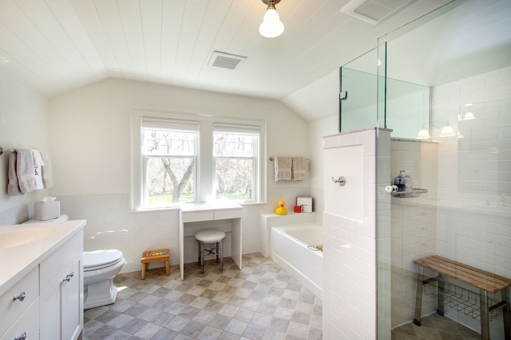 10 River Road Cohasset, MA 02025 - Photo 23 of 42 a white bath tub sitting next to a white toilet and sink