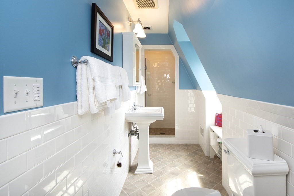 10 River Road Cohasset, MA 02025 - Photo 26 of 42 a living room with furniture and a flat screen tv