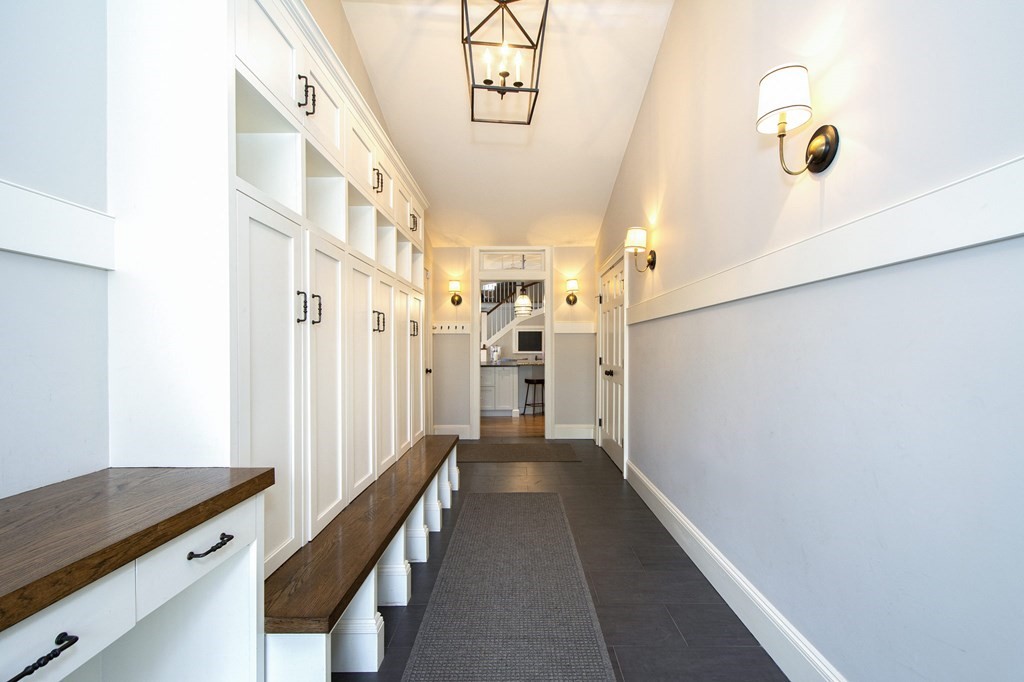 10 River Road Cohasset, MA 02025 - Photo 3 of 42 a view of a hallway with windows