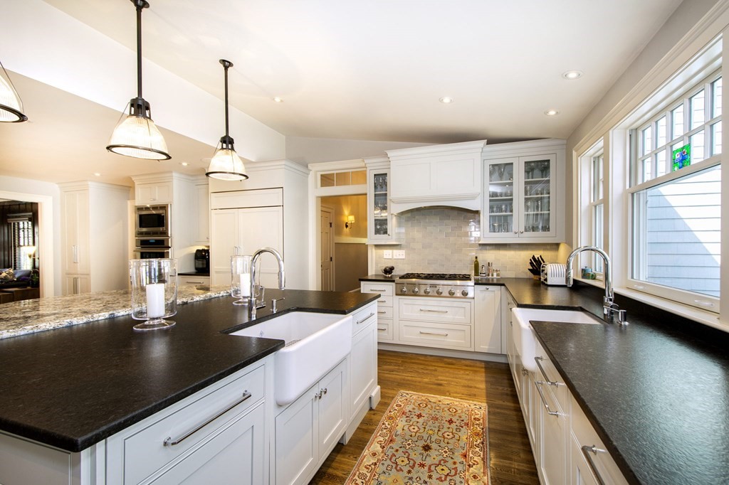 10 River Road Cohasset, MA 02025 - Photo 5 of 42 a kitchen with stainless steel appliances granite countertop a sink stove and window