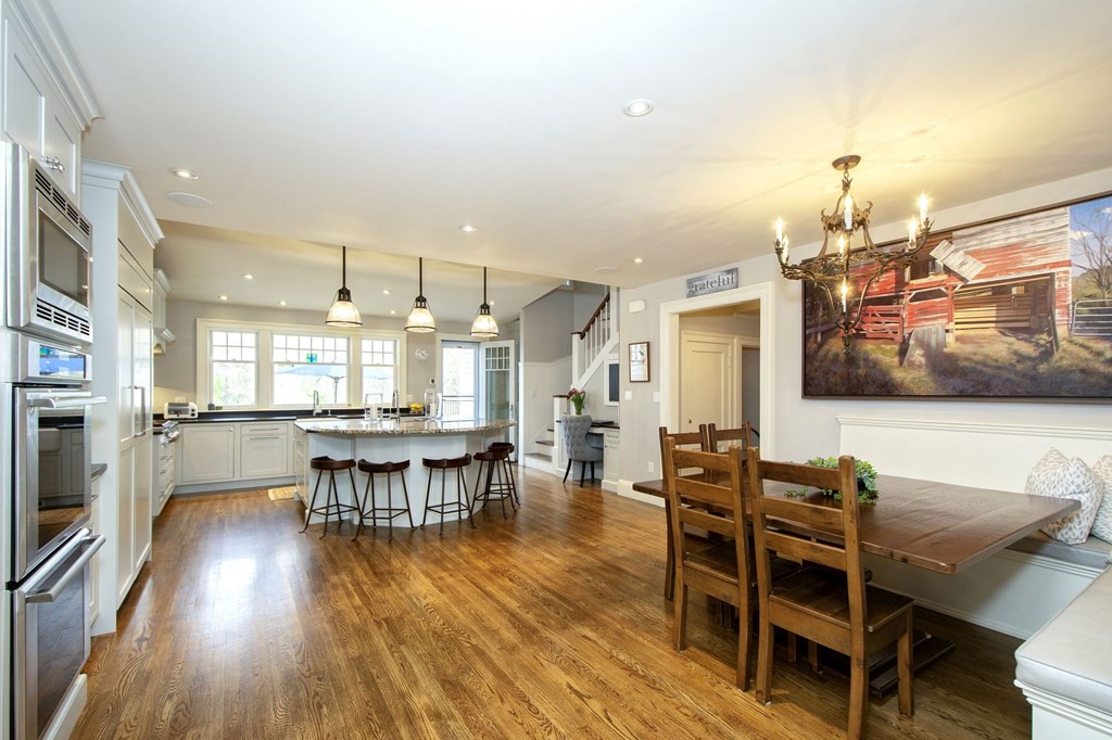 10 River Road Cohasset, MA 02025 - Photo 7 of 42 a view of a dining room with furniture and wooden floor