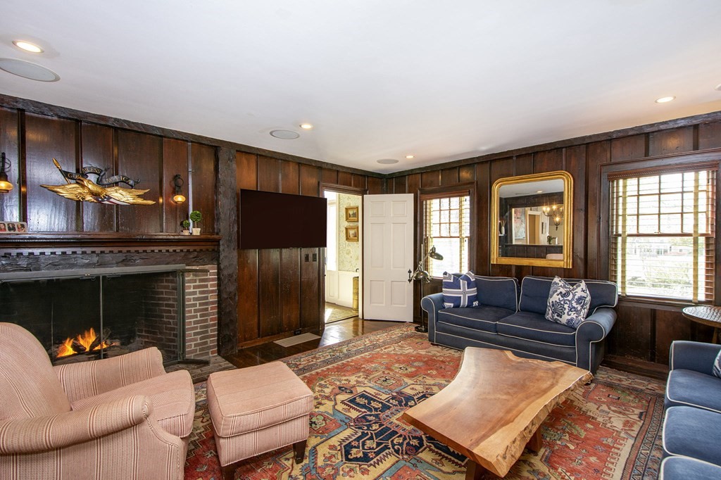10 River Road Cohasset, MA 02025 - Photo 9 of 42 a living room with furniture fireplace and flat screen tv
