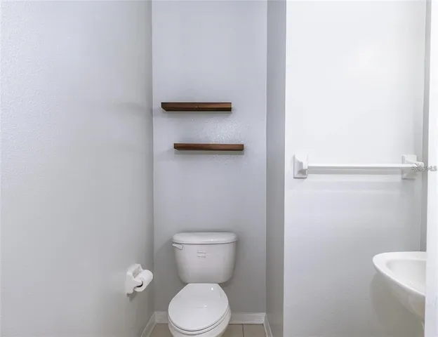 a bathroom with a toilet
