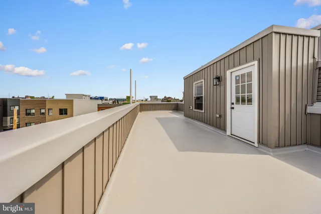 a view of a kitchen with a sink