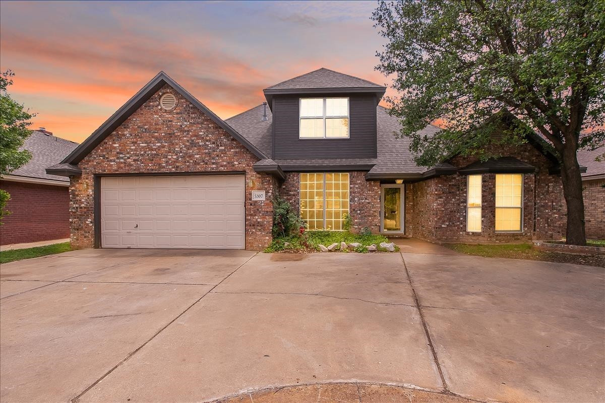 5307 69th Street Lubbock, TX 79424 - Photo 1 of 22 a view of backyard of a house