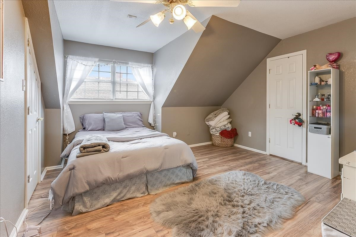 5307 69th Street Lubbock, TX 79424 - Photo 13 of 22 a bedroom with a bed and a window