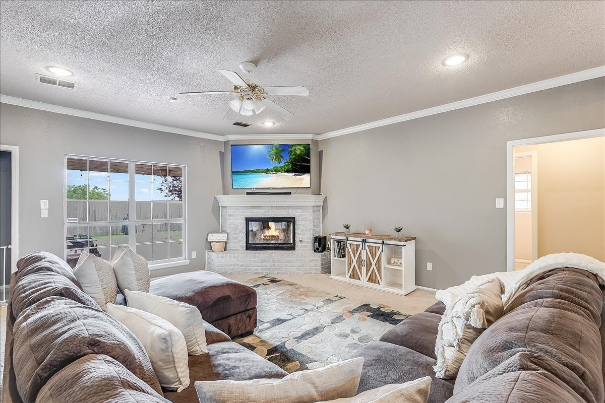 5307 69th Street Lubbock, TX 79424 - Photo 5 of 22 a bedroom with a bed and wooden floor
