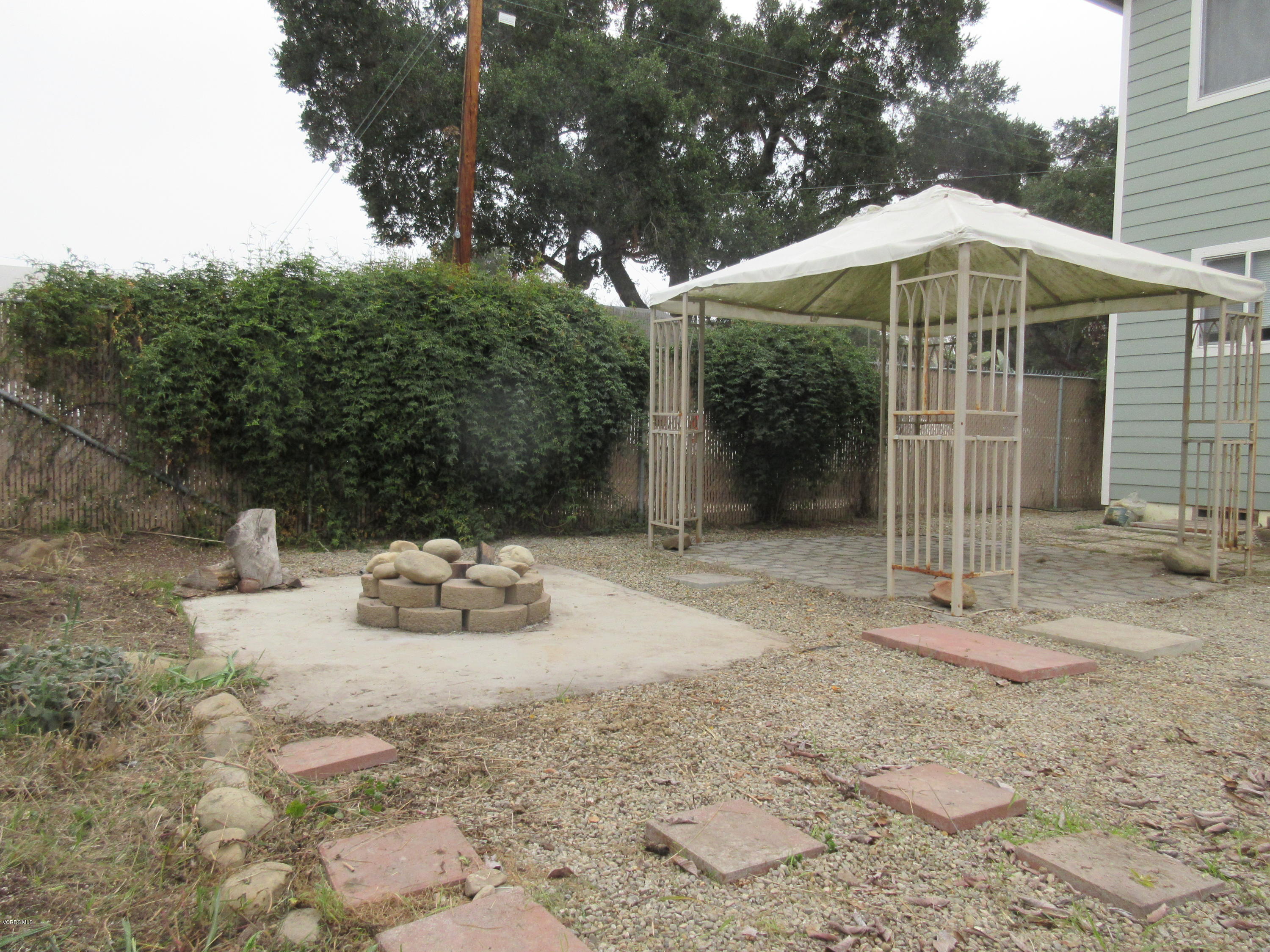 495 Burnham Road Oak View, CA 93022 - Photo 3 of 17 a backyard of a house with seating space