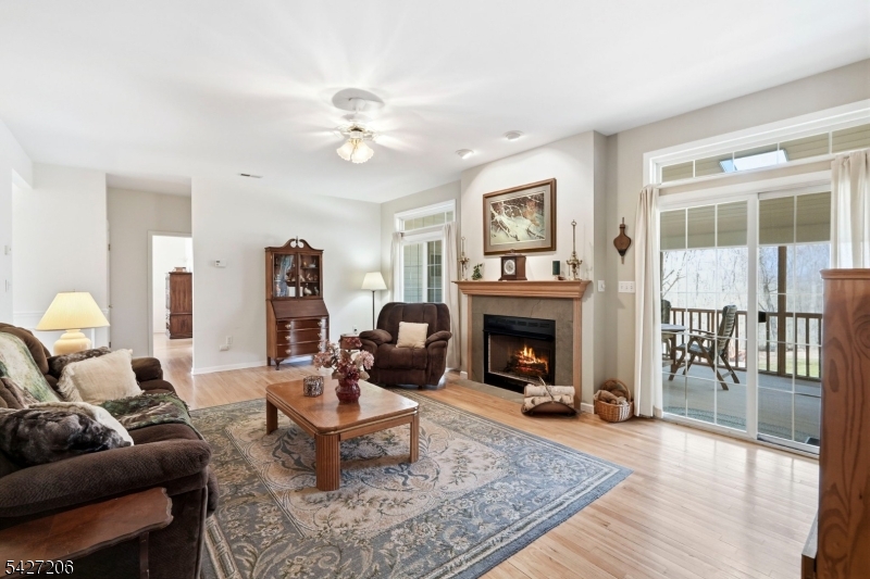 140 Bunker Hill Road Princeton, NJ 08540 - Photo 15 of 44 a living room with furniture and a fireplace