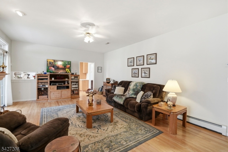 140 Bunker Hill Road Princeton, NJ 08540 - Photo 16 of 44 a living room with furniture and wooden floor