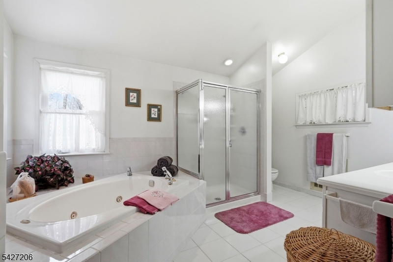 140 Bunker Hill Road Princeton, NJ 08540 - Photo 20 of 44 a bath room with a bed and a couch