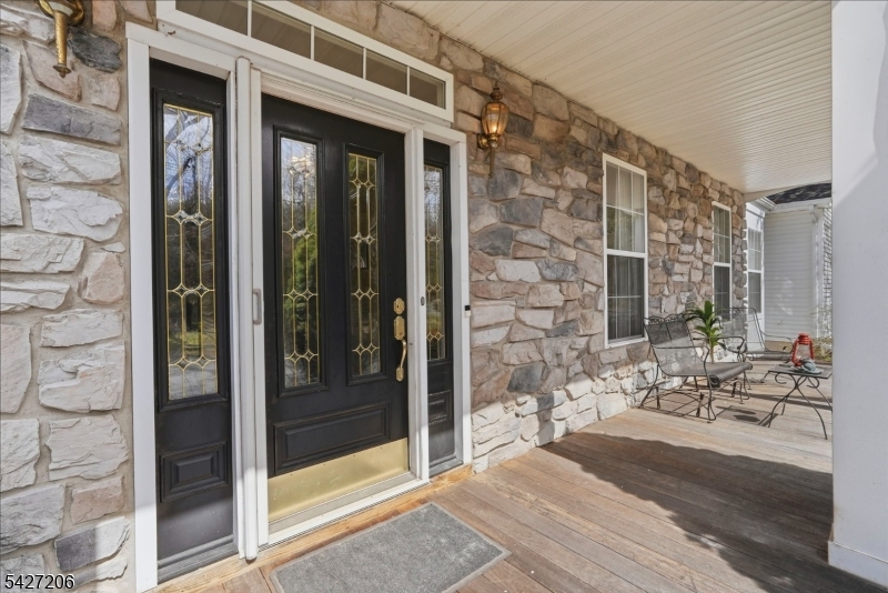 140 Bunker Hill Road Princeton, NJ 08540 - Photo 2 of 44 a view of a brick building with a glass door