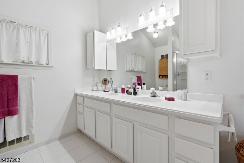 140 Bunker Hill Road Princeton, NJ 08540 - Photo 21 of 44 a bathroom with a sink vanity and mirror