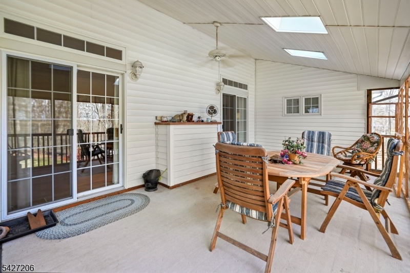 140 Bunker Hill Road Princeton, NJ 08540 - Photo 26 of 44 a view of a workspace with furniture and a window