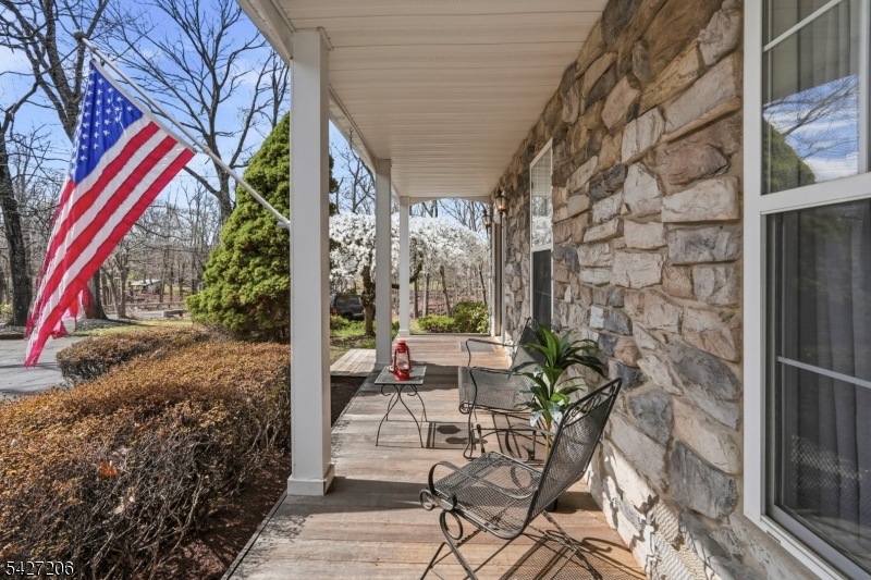 140 Bunker Hill Road Princeton, NJ 08540 - Photo 3 of 44 a view of a chairs and table in a backyard