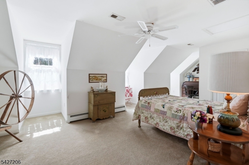 140 Bunker Hill Road Princeton, NJ 08540 - Photo 32 of 44 a bedroom with furniture and a window
