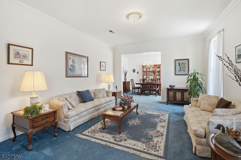 140 Bunker Hill Road Princeton, NJ 08540 - Photo 6 of 44 a living room with furniture a lamp and a window