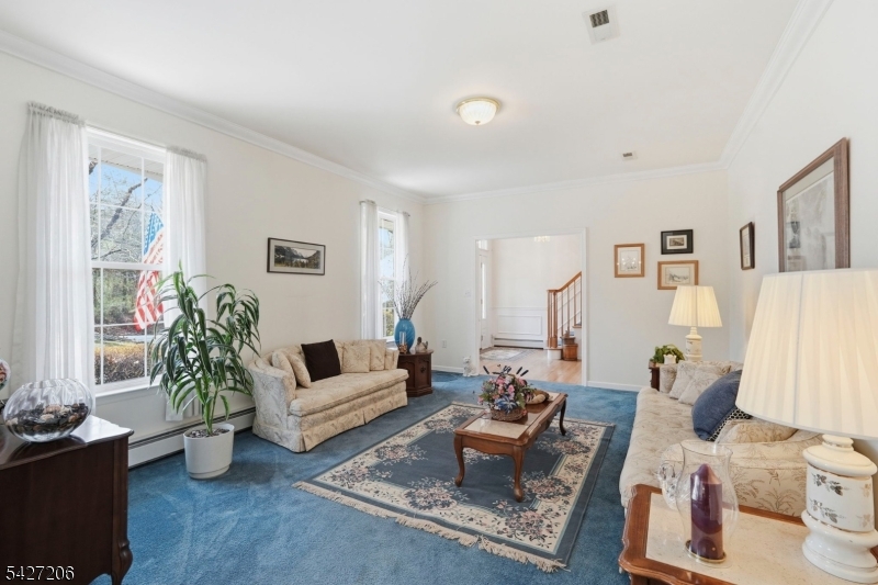 140 Bunker Hill Road Princeton, NJ 08540 - Photo 7 of 44 a living room with furniture and a large window